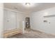 Unfinished basement with concrete floor, water heater, and utility connections at 452 S Horne --, Mesa, AZ 85204