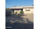 Classic desert home featuring mature landscaping, offering comfortable suburban living with a welcoming front entrance at 4613 N 24Th Pl, Phoenix, AZ 85016