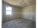 Cozy bedroom with fresh drywall, a window for natural light, and a clean canvas for decor at 47219 W Pecan Woods --, Maricopa, AZ 85139