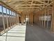 Interior framing of a new home showing an open floorplan at 47219 W Pecan Woods --, Maricopa, AZ 85139