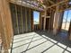 Interior view of framed room under construction with visible insulation and window framing at 47219 W Pecan Woods --, Maricopa, AZ 85139