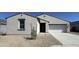 Charming single-story home with a two car garage, desert landscaping, and neutral paint at 47219 W Pecan Woods --, Maricopa, AZ 85139