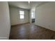 Living room with tile floors and plenty of natural light at 47219 W Pecan Woods --, Maricopa, AZ 85139