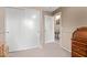 Spare bedroom with carpet, and view of hallway and closet at 4757 E Goldfinch Gate Ln, Phoenix, AZ 85044