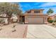 Beautiful single Gathering house with front lawn landscaping, a two car garage, and a desert feel at 4757 E Goldfinch Gate Ln, Phoenix, AZ 85044