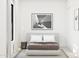 Modern bedroom featuring minimalist decor, a comfortable bed, and an art piece at 491 E Aurora Dr, San Tan Valley, AZ 85140