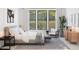 Bright bedroom with a modern design, large windows, and neutral tones at 491 E Aurora Dr, San Tan Valley, AZ 85140