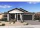Charming single-story home with neutral stucco, black trim, and desert landscaping for a modern look at 491 E Aurora Dr, San Tan Valley, AZ 85140
