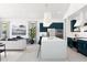 Open-concept living space with a stylish kitchen, comfortable seating area, and abundant natural light at 491 E Aurora Dr, San Tan Valley, AZ 85140