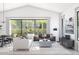 Inviting living space with comfortable seating, large windows offering scenic views, and modern decor at 491 E Aurora Dr, San Tan Valley, AZ 85140
