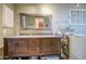 Bathroom features a large mirror, starfish decor, and neutral paint at 538 E Rockwood Dr, Phoenix, AZ 85024