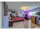 Cozy bedroom featuring mauve walls, mixed patterns, and ample lighting at 538 E Rockwood Dr, Phoenix, AZ 85024
