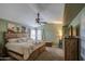 Inviting primary bedroom with lots of space and a ceiling fan at 538 E Rockwood Dr, Phoenix, AZ 85024