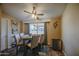Charming dining area featuring a ceiling fan and views of the front yard at 538 E Rockwood Dr, Phoenix, AZ 85024