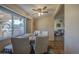 Cozy dining area with a window and view of the front yard, adjacent to the living room at 538 E Rockwood Dr, Phoenix, AZ 85024