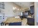 Spacious kitchen with an island featuring granite countertops, black cabinets and stainless appliances at 538 E Rockwood Dr, Phoenix, AZ 85024
