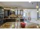 Updated kitchen with granite countertops, stainless steel appliances and pendant lighting at 538 E Rockwood Dr, Phoenix, AZ 85024