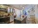 Open concept kitchen with granite countertops and stainless steel appliances at 538 E Rockwood Dr, Phoenix, AZ 85024