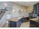 Spacious kitchen featuring granite countertops, modern appliances, and custom cabinets at 538 E Rockwood Dr, Phoenix, AZ 85024