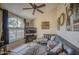 Cozy living room featuring a vaulted ceiling and large window at 538 E Rockwood Dr, Phoenix, AZ 85024