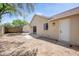 The backyard features desert landscaping, a patio, and a backdoor entrance at 6335 E Brown Rd # 1065, Mesa, AZ 85205