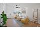 Bright living room featuring modern furniture, high ceilings, and lots of natural light at 6335 E Brown Rd # 1065, Mesa, AZ 85205