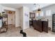 Inviting dining area with unique bar, tile floors, and an open floor plan at 720 E Cobble Stone Dr, Queen Creek, AZ 85140