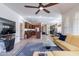Open-concept living space showcases a bright living room and kitchen area, perfect for entertaining at 720 E Cobble Stone Dr, Queen Creek, AZ 85140