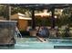 Relaxing pool area with crystal clear water and covered cabanas for ultimate relaxation at 720 E Cobble Stone Dr, Queen Creek, AZ 85140