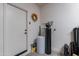 Functional utility room includes a water softener system and storage space for household needs at 720 E Cobble Stone Dr, Queen Creek, AZ 85140
