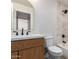 Bathroom features a vanity with a sink, toilet and tiled shower at 7647 E Montecito Ave, Scottsdale, AZ 85251