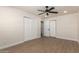 Bedroom features wood-look floors, a ceiling fan, recessed lighting and closets at 7647 E Montecito Ave, Scottsdale, AZ 85251