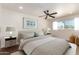 Serene bedroom featuring a queen bed, neutral tones, and minimalist decor for a restful retreat at 7647 E Montecito Ave, Scottsdale, AZ 85251