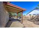 The spacious backyard features a covered patio perfect for enjoying outdoor living and entertaining at 7844 W Jenan Dr, Peoria, AZ 85345