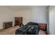 Cozy bedroom featuring neutral walls, carpet, and storage at 7844 W Jenan Dr, Peoria, AZ 85345