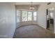 Bright dining area with natural light from the bay window at 7844 W Jenan Dr, Peoria, AZ 85345