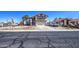 Two-story home featuring a red-tiled roof, two-car garage, and well-kept landscaping at 7844 W Jenan Dr, Peoria, AZ 85345
