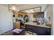 Kitchen features granite countertops, wood cabinets, and stainless steel appliances at 7844 W Jenan Dr, Peoria, AZ 85345