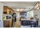 Kitchen features granite countertops, wood cabinets, and stainless steel appliances at 7844 W Jenan Dr, Peoria, AZ 85345