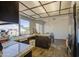 Bright kitchen featuring granite countertops and tile flooring at 7844 W Jenan Dr, Peoria, AZ 85345