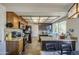 Kitchen features granite countertops, wood cabinets, and stainless steel appliances at 7844 W Jenan Dr, Peoria, AZ 85345