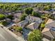 Beautiful aerial view of home showcasing its prime location, three car garage and neighborhood at 834 W Whitten St, Chandler, AZ 85225