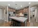 Modern kitchen with stainless steel appliances, granite counters, and a large island at 834 W Whitten St, Chandler, AZ 85225