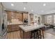Well-equipped kitchen featuring a center island, updated appliances, and sleek cabinetry at 834 W Whitten St, Chandler, AZ 85225