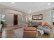 Bright living room with arched doorway, stylish decor, and comfortable seating area at 834 W Whitten St, Chandler, AZ 85225