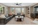 Inviting living room with a large window, comfortable seating, and stylish decor at 834 W Whitten St, Chandler, AZ 85225