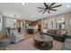 Open-concept living area with modern furnishings, flowing into the kitchen and dining spaces at 834 W Whitten St, Chandler, AZ 85225