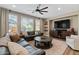 Spacious living room with a large window, modern furnishings, and ample natural light at 834 W Whitten St, Chandler, AZ 85225