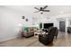 Inviting living room with hardwood floors, comfortable furnishings, and natural light at 855 S Revolta Cir, Mesa, AZ 85208