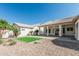 Spacious backyard with covered patio, desert landscaping, and ample room for outdoor enjoyment at 862 W Rawhide Ave, Gilbert, AZ 85233